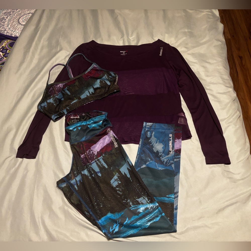 Reebok Les Mills Mountain Legging, Bra, and Deep Purple Top Set.